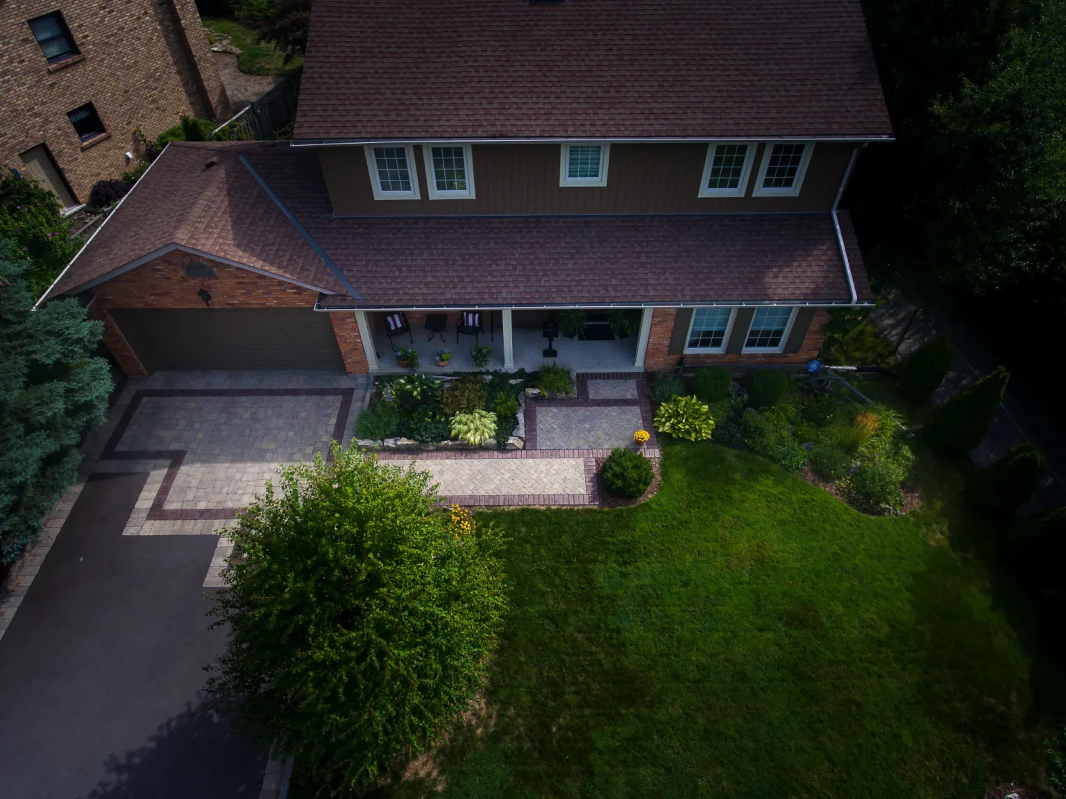 Oblique aerial view of the home and completed front approach in Ancaster.